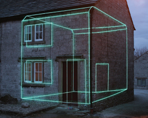 Photo of a house showing a digital neon frame