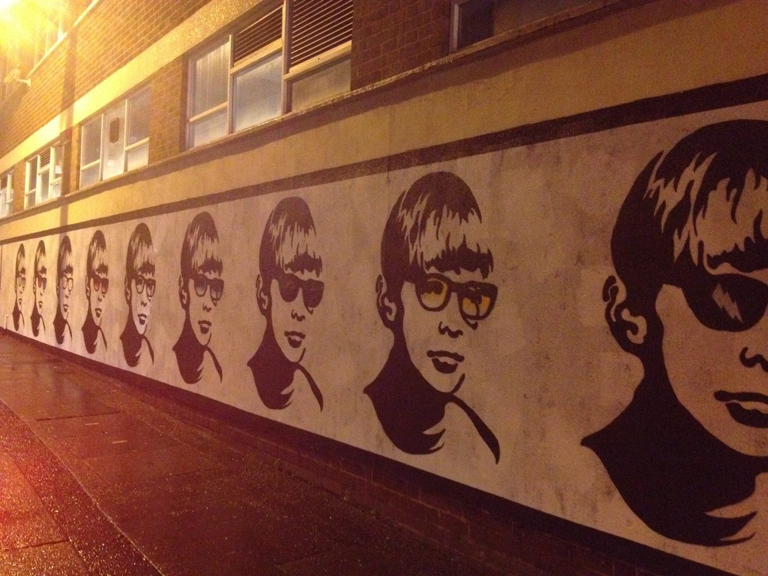 Photo of images on wall of building