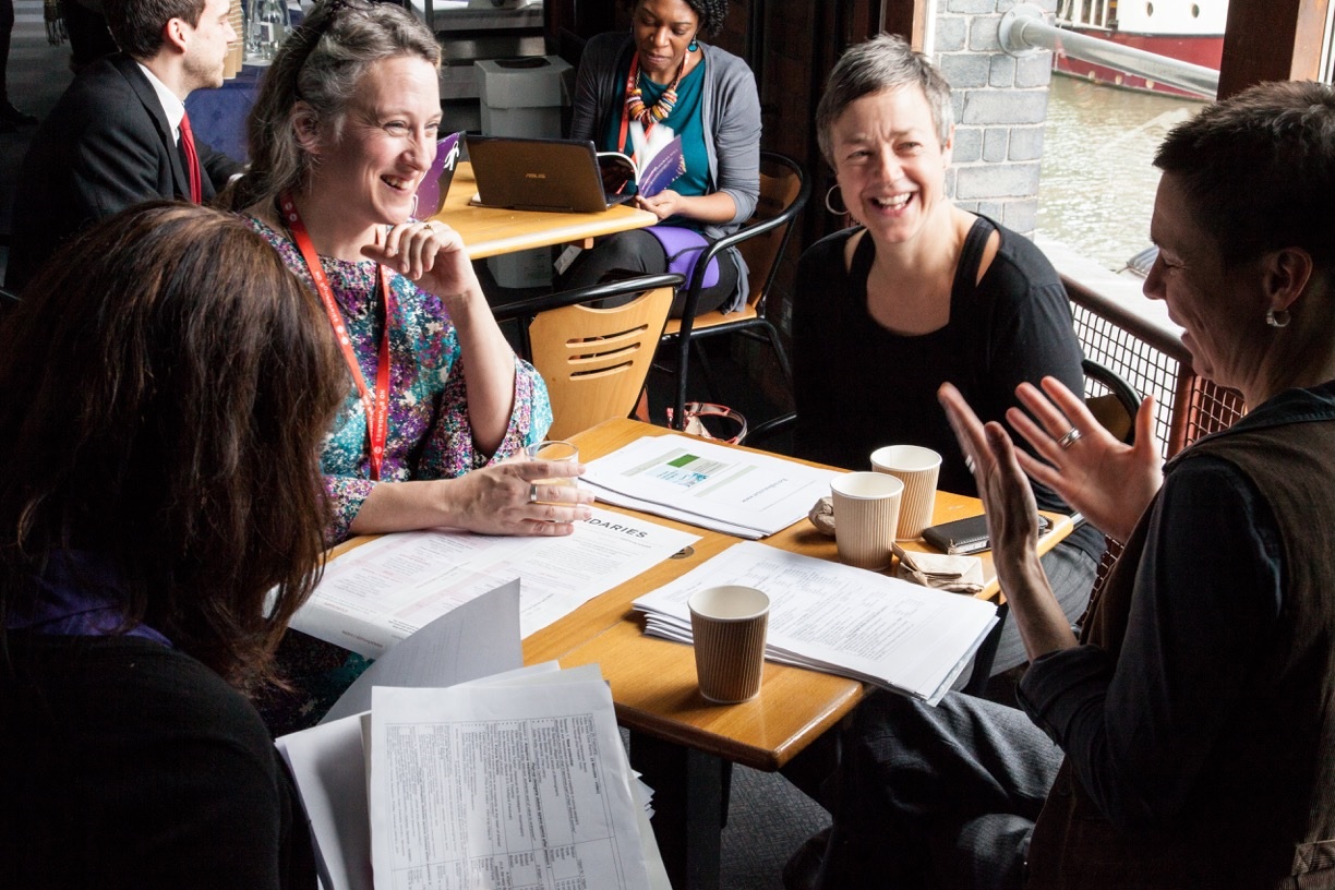 Photo of women working at table