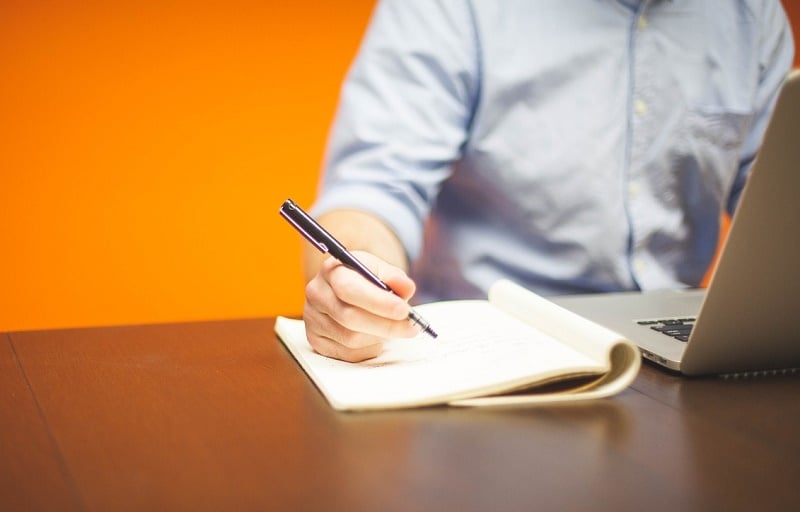 Photo of man with laptop