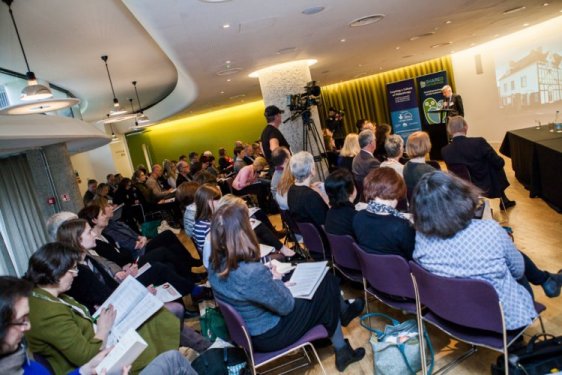 Photo of people at a conference