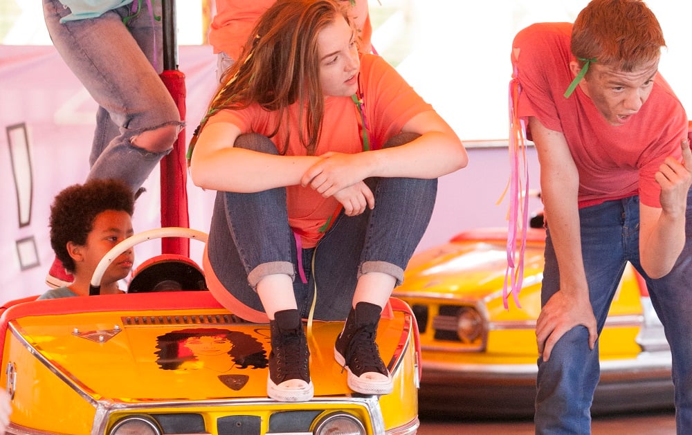 Young people performing on dodgems