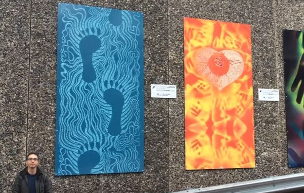 Olivier Jamin with his artworks