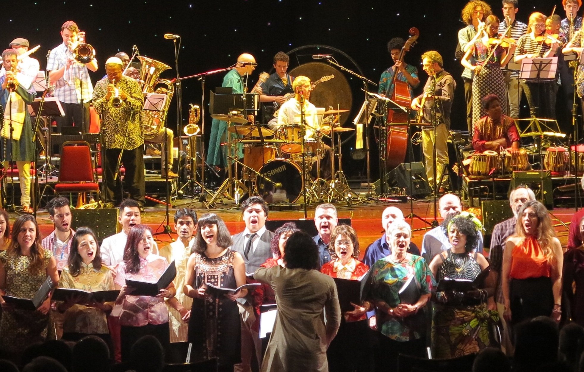 Photo of musicians and singers on stage