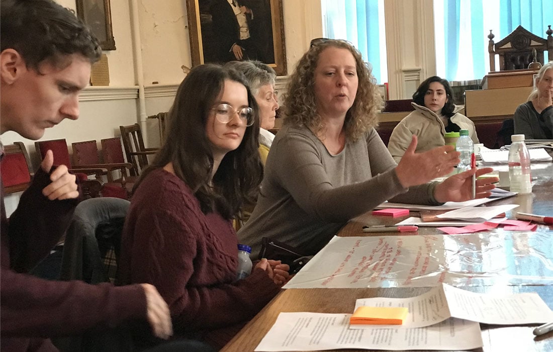 Group of people meeting at a conference table