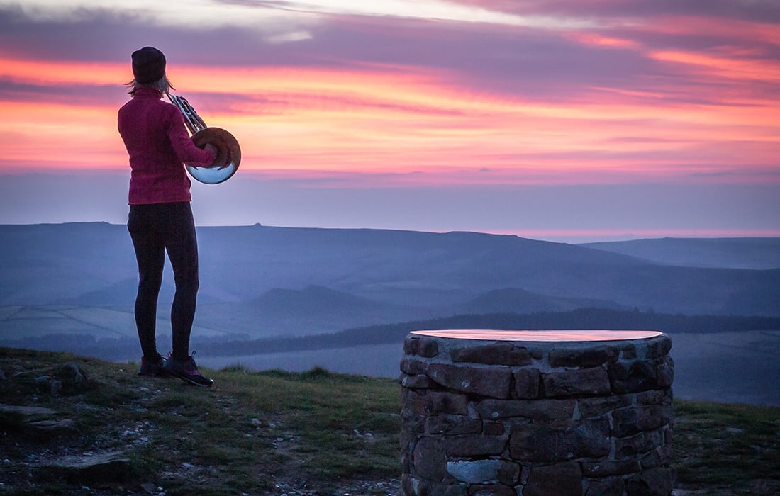 Naomi Atherton recording her video at sunrise