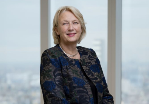 Jayne-Anne Gadhia a woman with short blonde hair wearing a blue floral jacket