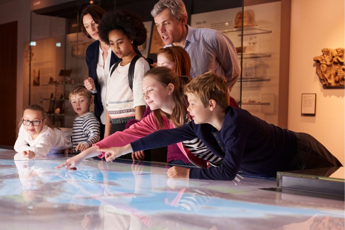 Children looking at a map at a museum