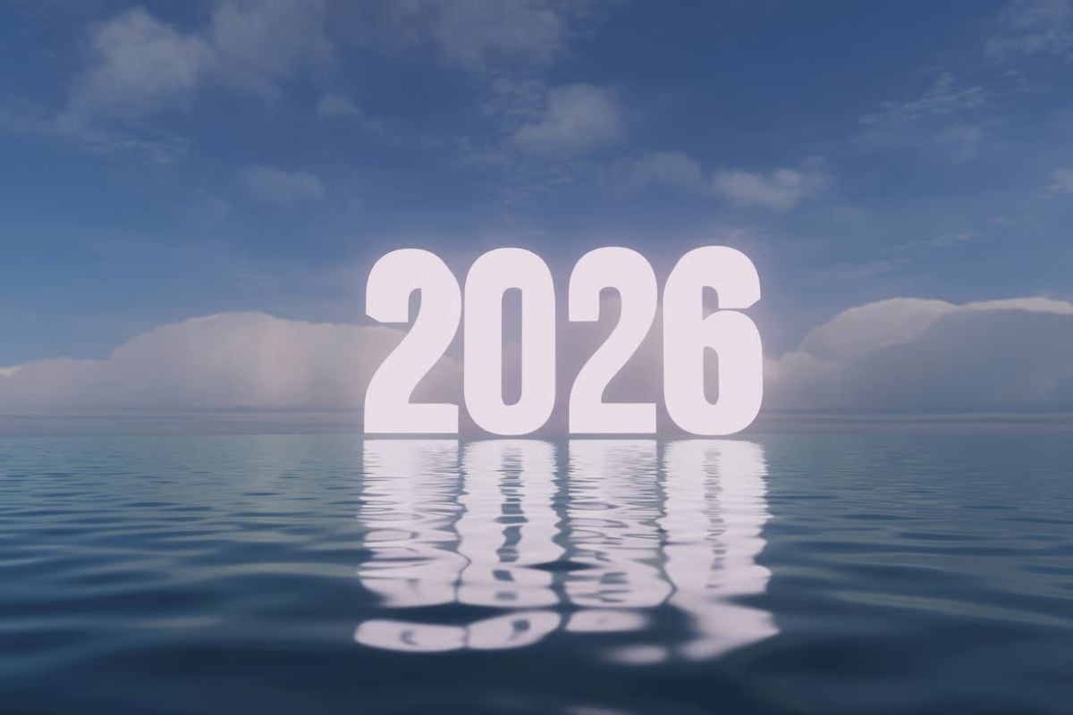 The year 2026 illuminated and reflected on calm, blue water. bright sky with soft, white clouds, conveying a hopeful and expansive future. Ideal for themes of optimism, fresh starts, and new beginning