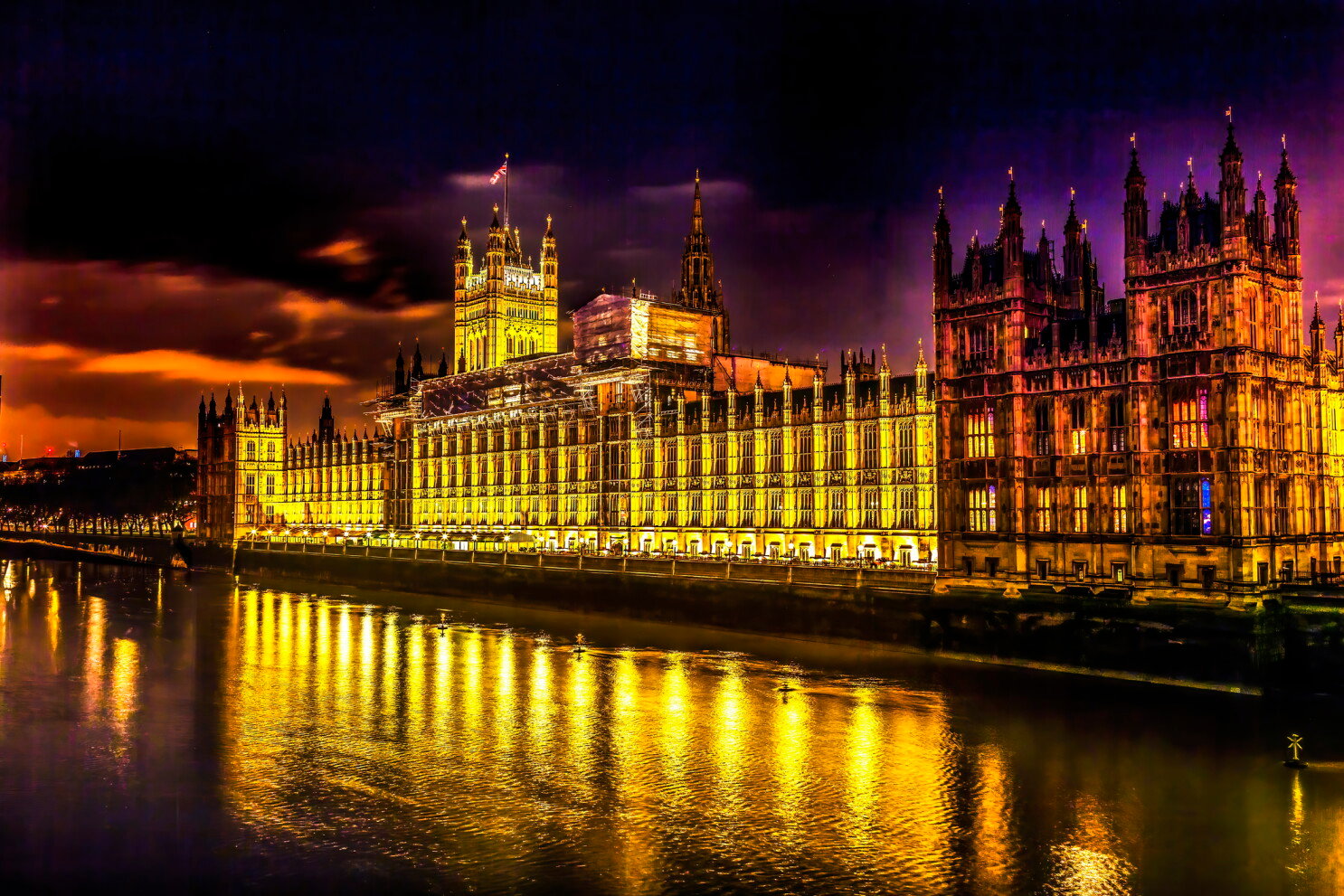 Victoria Tower Houses of Parliament Westminster Bridge Night Stars London England.  Built in the 1800s, House of Commons and House of Lords.