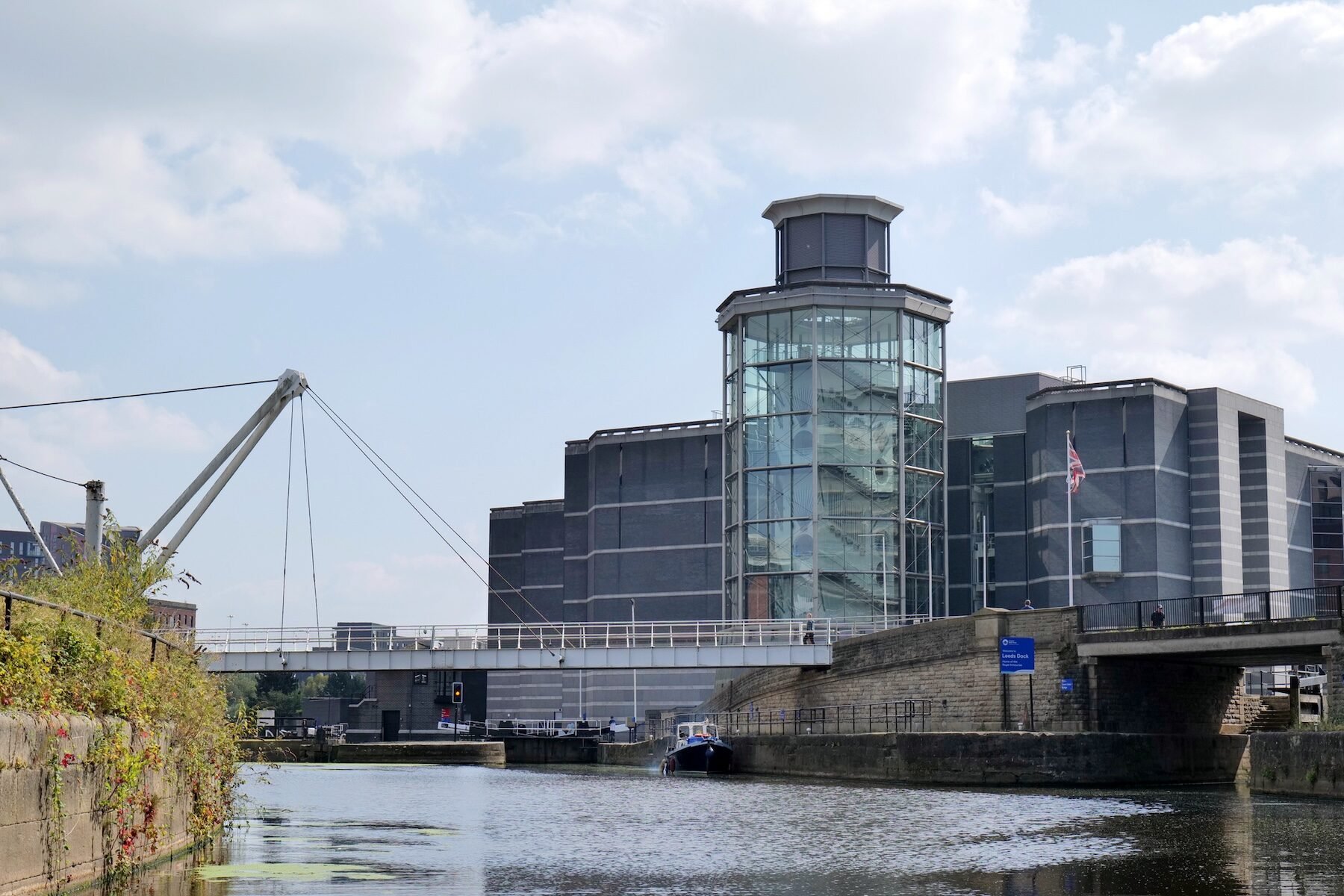 Leeds, UK 08 30 2024 View of the Royal Armouries Museum as seen from the River Aire in the centre of city.