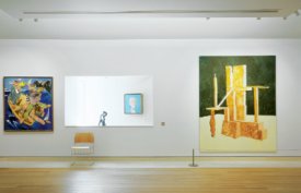 Three paintings on the wall of Pallant House Gallery