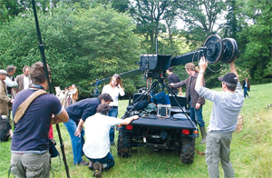 A film crew in a field