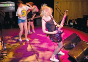 Teenage punk band Spiked performing to delegates at In Your Hands. Photo: Emile Holba