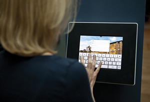 Visitor uses an iPad at Dulwich Picture Gallery