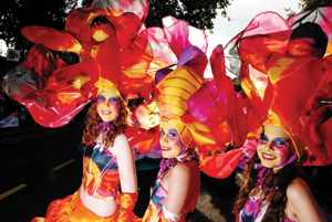 3 young girls in carnival costumes
