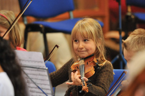 Young girl playing the Violin