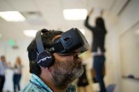 Photo of man with virtual reality headset on