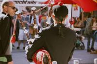 Photo of bagpipe player