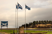Three Scottish flags on the Scottish border