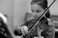 Child playing violin