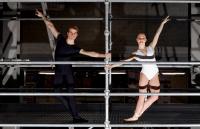 Photo of two ballet dancers on scaffolding