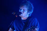 Ed Sheeran performing on stage