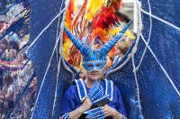 Photo of someone in bright blue carnival dress