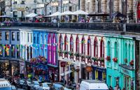 A photograph of colourful houses on a street in Edinburgh