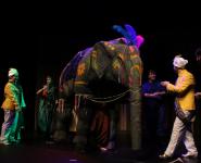 Photo of a theatre elephant & actors