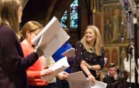 Photo of ORA Singers in rehearsal for one of their new commissions