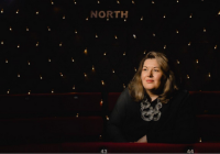 Karen O'Neill, incoming Executive Director and CEO, HOME. Captured in front of an artificial starry backdrop, featuring the word 'north.'