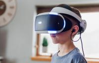 young girl wearing a virtual reality headset