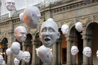 Photo of hanging heads exhibit at the Kelvingrove Art Gallery & Museum
