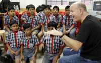 Richard Frostick delivers singing workshops for children in India.
