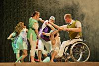 Photo of dancers, one in wheelchair