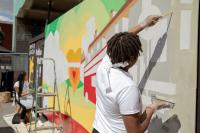 Community mural being painted in Peckham Square: an example of the kind of work that can be funded through CIL