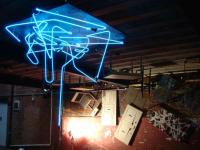 Image of glass/neon sculpture and furniture installation