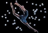Photo of dancer with juggling balls