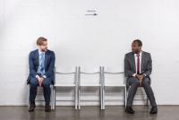 Two men waiting for an interview