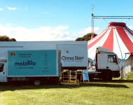 Photo of mobiloo outside circus tent