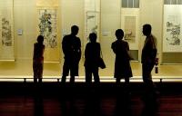 Photo of people in a museum