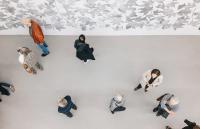 An overhead photo of people in an art gallery