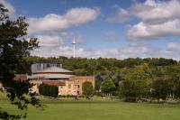 Glyndebourne Opera House with its wind turbine in the background