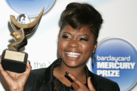 Speech Debelle pictured with the Mercury Prize award