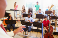 Pupils Playing Musical Instruments In School Orchestra