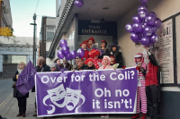 Save Oldham Coliseum campaigners outside the theatre holding banners and balloons