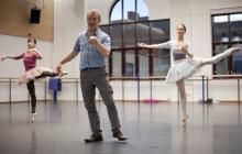 Photo of David Bintley in rehearsal with two dancers