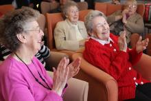 Photo of elderly people celebrating
