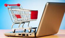 Photo of shopping trolley on laptop